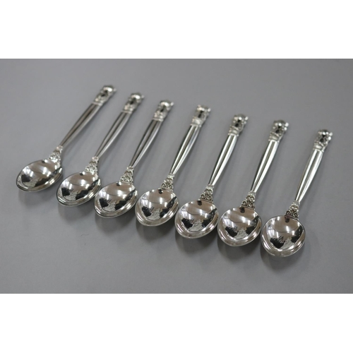 245 - Set of six Georg Jensen Acorn pattern silver teaspoons, approx 85 grams (7)