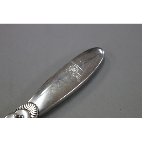 249 - Georg Jensen, cactus pattern sterling silver and stainless bottle opener