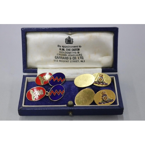 257 - Two pairs of the Royal Artillery Regoment cufflinks, one 9ct gold