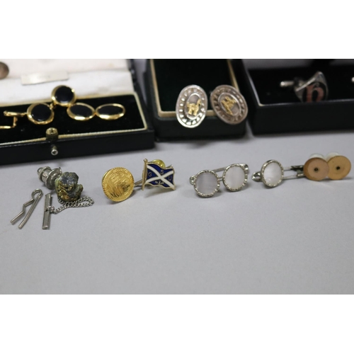 260 - Assortment of cufflinks buttons along with a silver pair of cufflinks