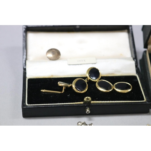 260 - Assortment of cufflinks buttons along with a silver pair of cufflinks