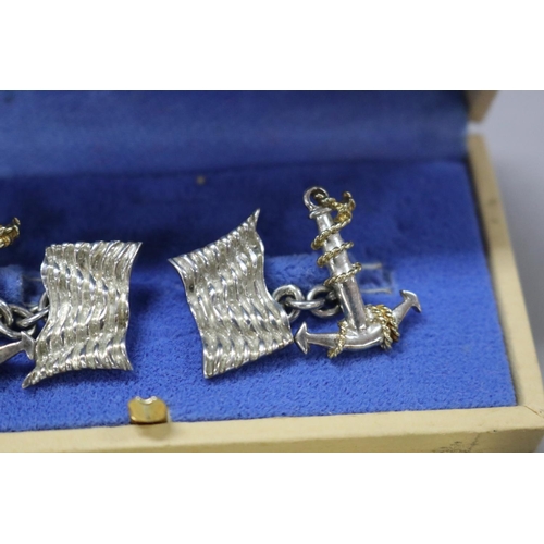 267 - Pair of Links of London silver cufflinks, in the form of anchor and flag in original box