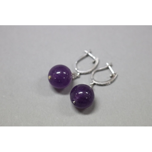 283 - Diamond and amethyst drop earrings set in 18ct white gold