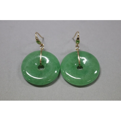 285 - Pair of jade and diamond disc earrings set in 14ct gold