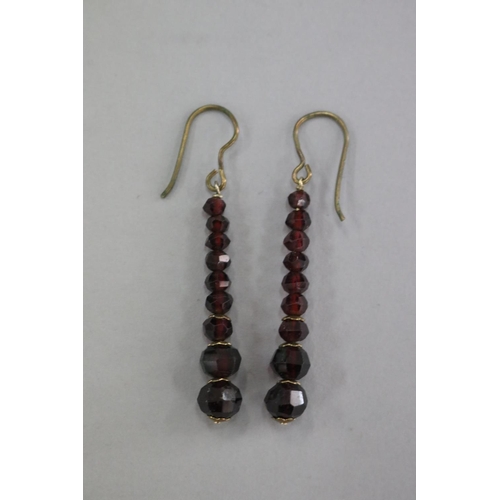 304 - Pair of Garnet drop earrings