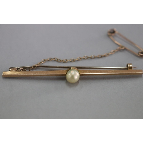 307 - Gold and pearl bar brooch