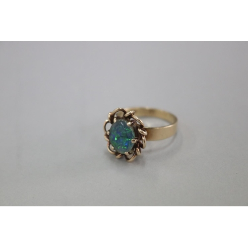 320 - SHOULD READ - 9ct gold and triplet black opal ring