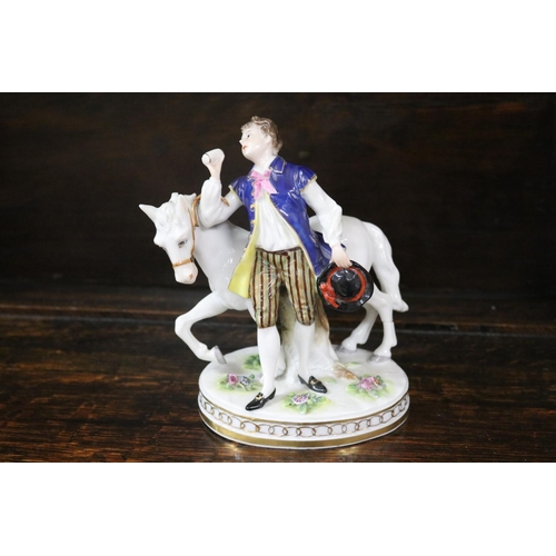36 - Three good quality porcelain figures - boy with grapes by Naples, young man with horse - Dresden, Yo... 