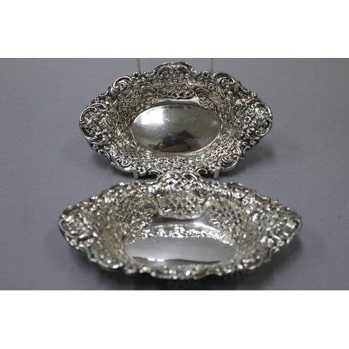 37 - Good pair of Sterling silver repousse oval London dishes, marked for Chester 1899-1900 (good weight)... 