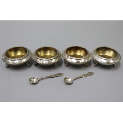 45 - Set of four antique sterling silver footed salts, London 1874 and two salt spoons, each approx 7cm D... 