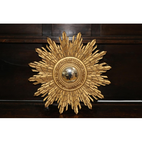 61 - Starburst bullseye mirror, note mirror is a later addition, approx 48cm Dia