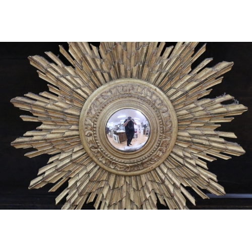 61 - Starburst bullseye mirror, note mirror is a later addition, approx 48cm Dia