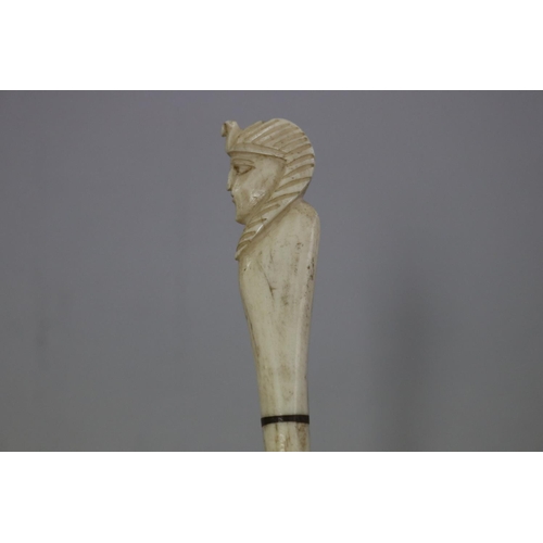 70 - Carved bone - Egyptian head handle fly-whisk, approx 18cm L