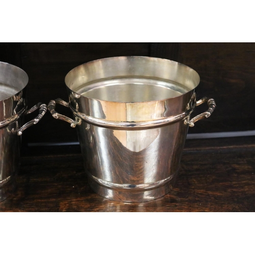 81 - Three hard soldered silver plate two handled champagne buckets, each approx 20cm H (3)