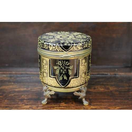 84 - Antique French raised enamel decorated amethyst box, griffen legs, approx 14cm H x 11cm Dia