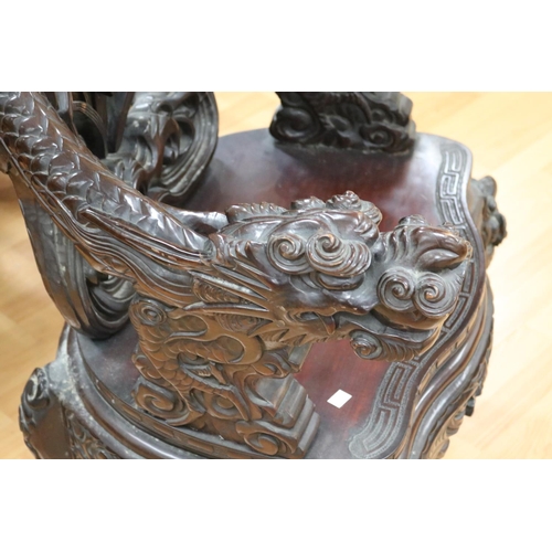 184 - Antique elaborate Asian carved Dragon arm chair