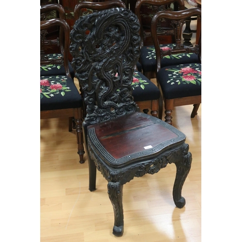 185 - Antique Japanese well carved wood chair, pierced carved back showing scrolling dragon and flame pear... 