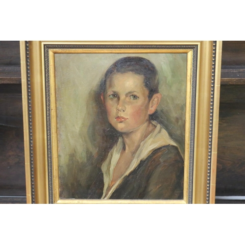 202 - Portrait of a young boy, oil on board, signed lower left, O. Holzhau, approx 38.5cm x 33.5cm