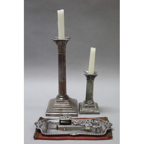 212 - Antique candle snuffer and tray along with two Sheffield plate Corinthian column candlesticks, appro... 