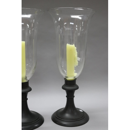 218 - Large pair of weighted bronze based storm lights, flared glass shades, each approx 53cm H (2)