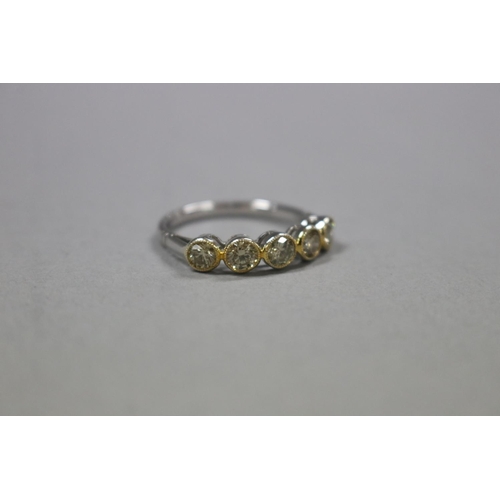 295 - Five stone yellow diamond ring set in 18ct white and yellow gold, with valuation