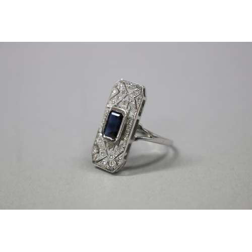 297 - Art Deco style dress ring natural blue sapphire and diamond set in 18ct white gold, as per valuation