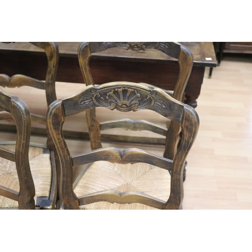 472 - Set of six French beech framed rush seated ladder back country chairs, spindle stretchers below (6)