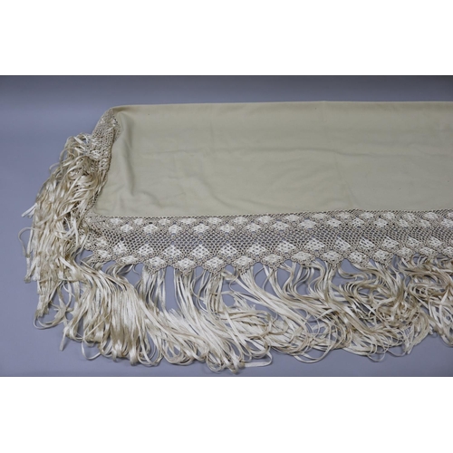 1 - Cream silk Macrame deep fringed wool shawl, of rectangular form, purchased in Paris, approx 172cm x ... 