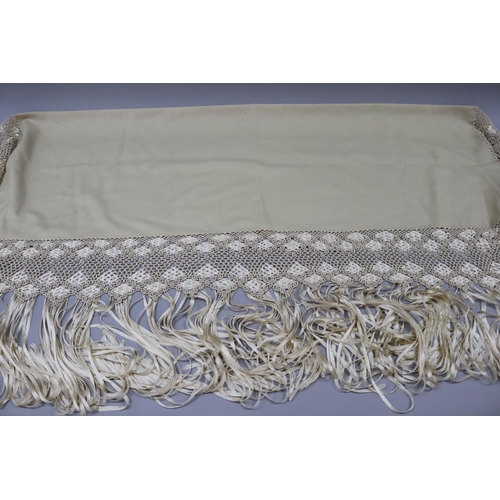 1 - Cream silk Macrame deep fringed wool shawl, of rectangular form, purchased in Paris, approx 172cm x ... 