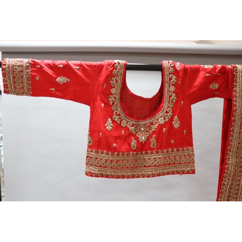 77 - Indian wedding costume, includes dress, skirt, top and shawl. Heavily embroidered and appliqued on s... 