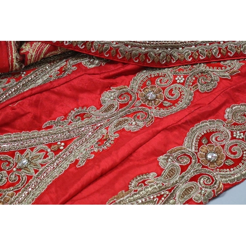 77 - Indian wedding costume, includes dress, skirt, top and shawl. Heavily embroidered and appliqued on s... 
