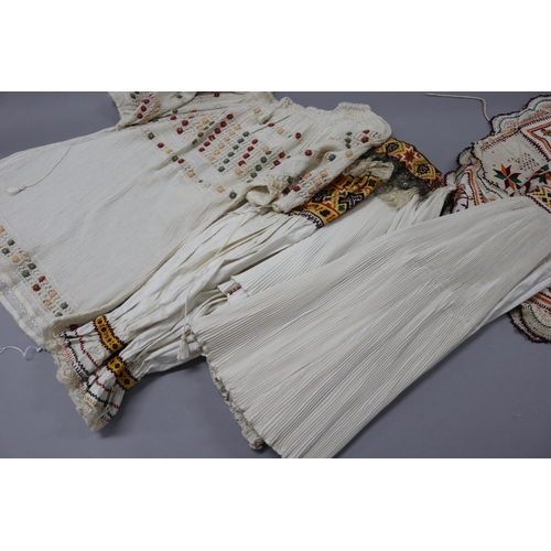 80 - Handspun and hand woven embroidered traditional blouse, purchased Bucharest along with a four tradit... 