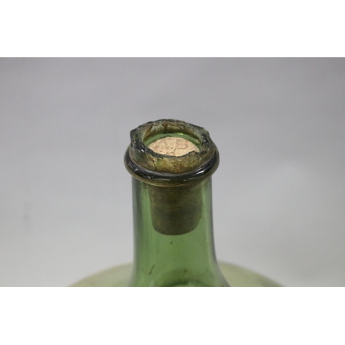 7 - Old French coloured glass wine makers bottle, approx 54cm H