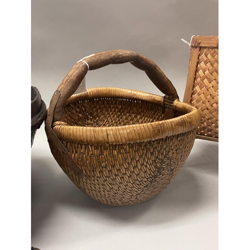 264 - Four hand made traditional baskets, likely Japanese and South East Asian origins, approx 30cm H x 40... 