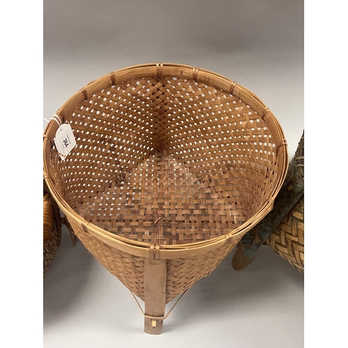 264 - Four hand made traditional baskets, likely Japanese and South East Asian origins, approx 30cm H x 40... 