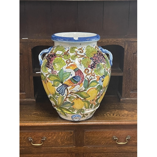 274 - Large Italian colourful hand painted terracotta twin handled pot, approx 53cm H