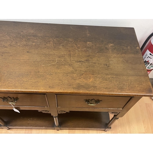 277 - English oak Georgian style three drawer pot board dresser, brass drop bale handles, approx 136cm L x... 