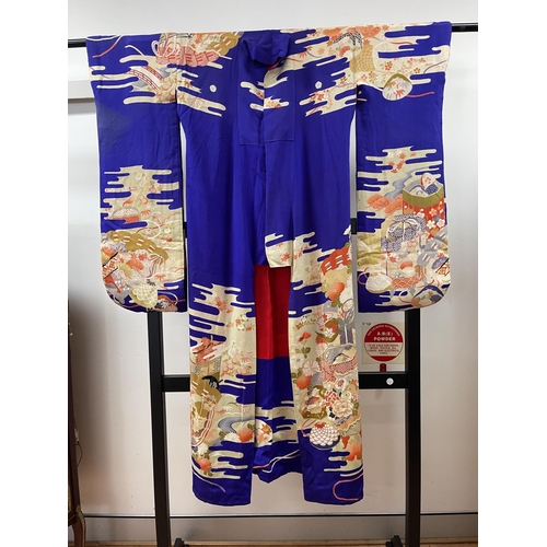 63 - Japanese silk kimono of blue ground, old traditional design