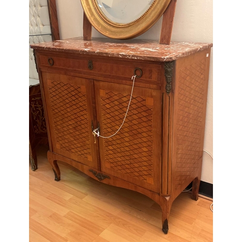 1023 - Early 20th century French marble topped transitional style marble topped two door cabinet, with rose... 