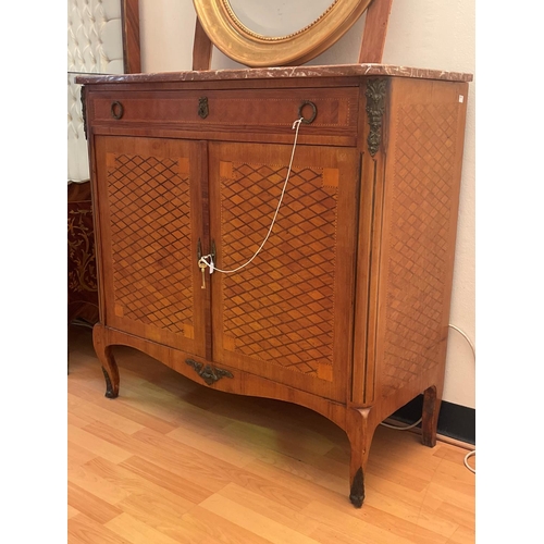 1023 - Early 20th century French marble topped transitional style marble topped two door cabinet, with rose... 