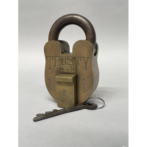 1026 - Large brass & iron Trusty padlock, Special Strong, Trusty. L. Co Aligarh. with key, eight lever