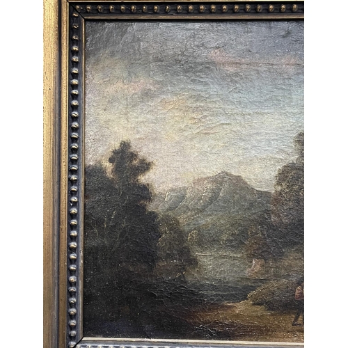 1054 - Early 19th century oil on canvas, figure by lakeside ruins, gilt framed, approx 23cm x 32cm
