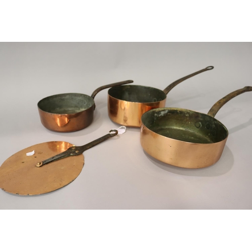 2 - Three antique copper saucepans along with a saucepan lid (4)