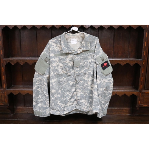 61 - Australian or USA camouflage jacket with label which includes NATO size. Good condition