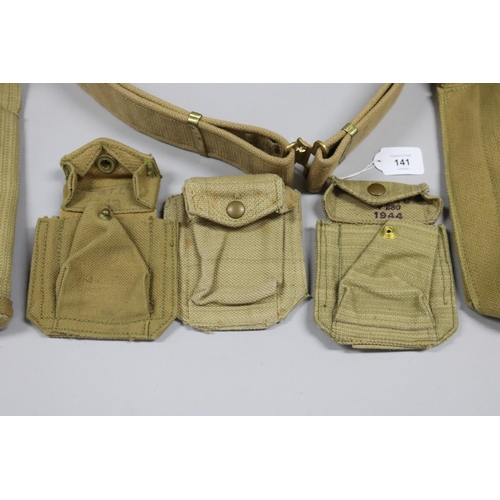 141 - Australian Army WW2 webbing lot of: i) belt, ii) revolver holster, iii) large belt pouch, iv) 3 ammo... 