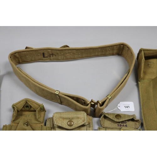 141 - Australian Army WW2 webbing lot of: i) belt, ii) revolver holster, iii) large belt pouch, iv) 3 ammo... 