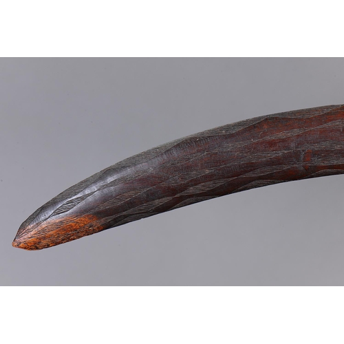 1067 - FINE EARLY ENGRAVED BOOMERANG, WESTERN NEW SOUTH WALES / SOUTHERN QUEENSLAND. Carved and engraved ha... 