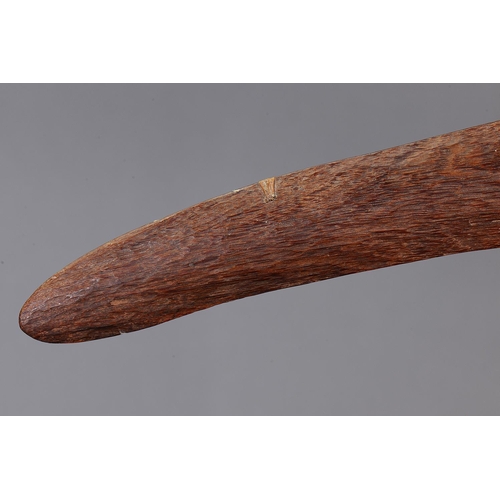 1087 - ADZED WESTERN DESERT BOOMERANG, WESTERN AUSTRALIA. Carved and adzed hardwood. Of plano-convex sectio... 