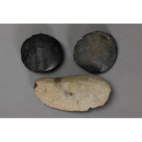 1094 - THREE EARLY STONE IMPLEMENTS, VICTORIA. Carved stone. Ground-edged hatchet/axe heads; unhafted. Fine... 