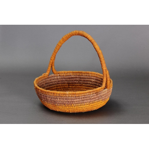 1097 - COILED PANDANUS BASKET, NORTHERN TERRITORY. Woven plant fibre. The basket is made from fibre using a... 